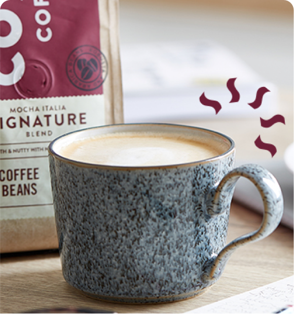 photo of mug and coffee beans