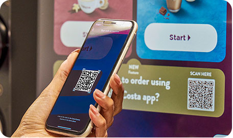 costa-x-hands-holding-phone-with-qr-codew